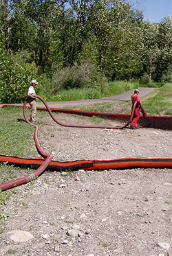 Benefits of ICCA Membership Crew Managing Erosion with Piping